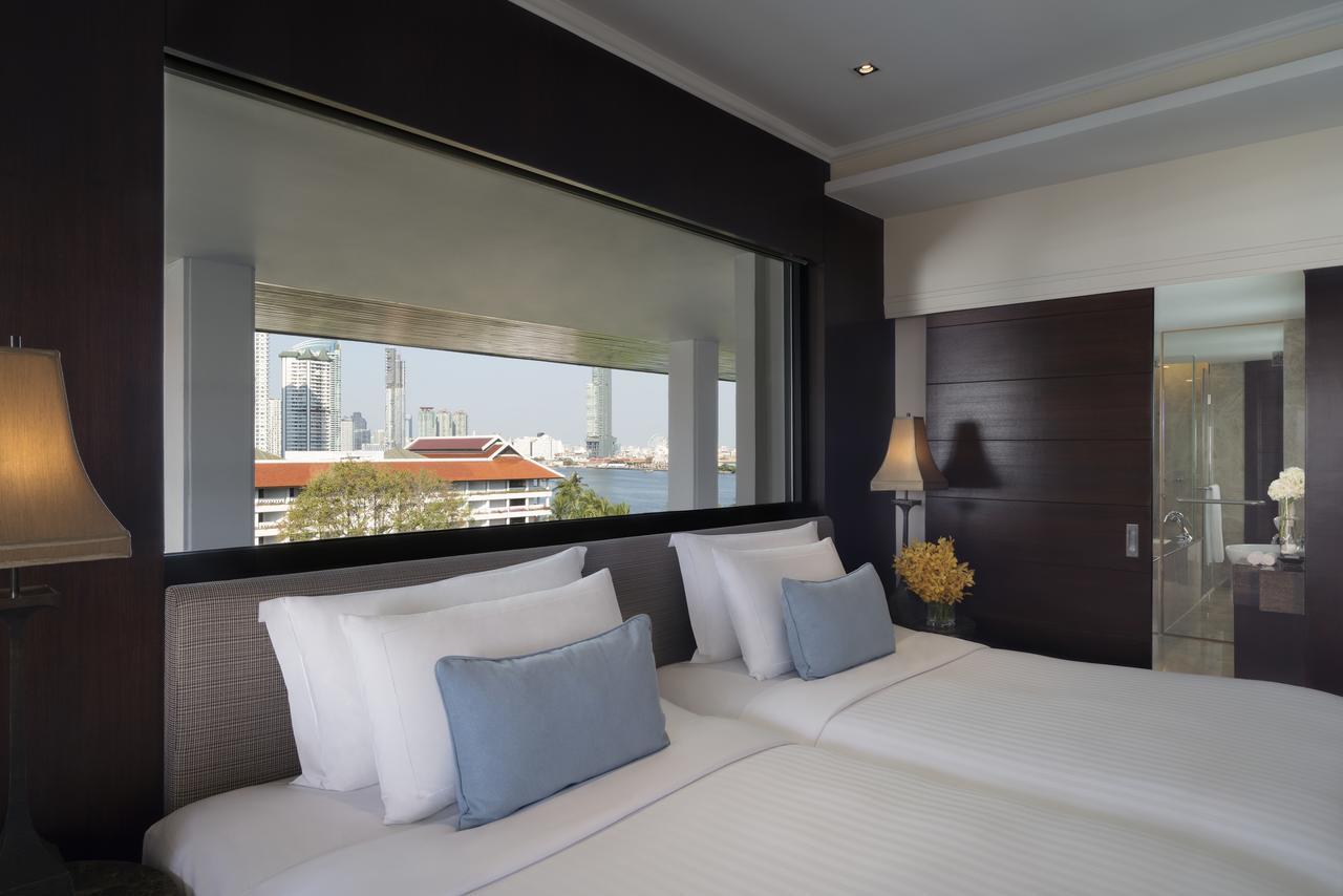 Anantara Riverside Bangkok Resort Екстериор снимка A bedroom at the hotel